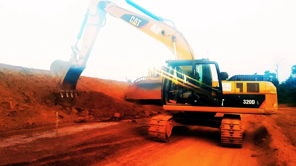 Tracked excavator carrying out earthworks on a LinCon site