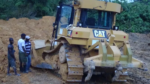 LinCon operators alongside a bulldozer on a mining support site